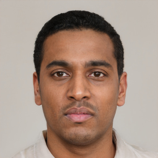 Neutral latino young-adult male with short  black hair and brown eyes