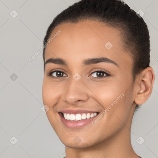 Joyful white young-adult female with short  brown hair and brown eyes