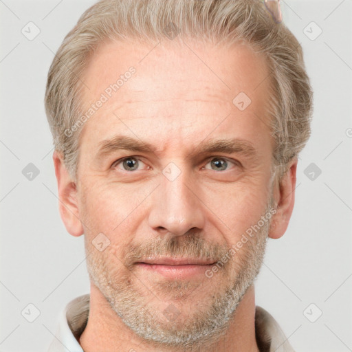 Joyful white adult male with short  brown hair and grey eyes