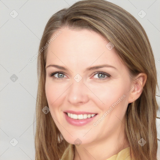 Joyful white young-adult female with long  brown hair and blue eyes