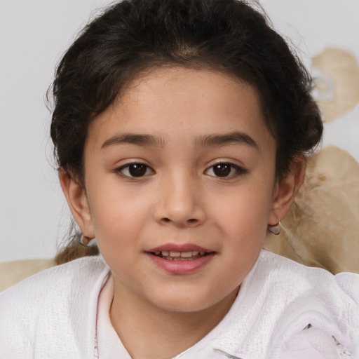 Joyful white child female with medium  brown hair and brown eyes