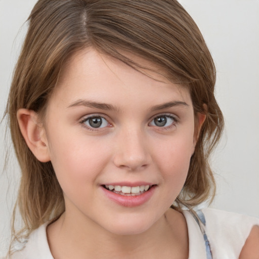 Joyful white child female with medium  brown hair and brown eyes