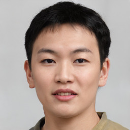 Neutral asian young-adult male with short  black hair and brown eyes