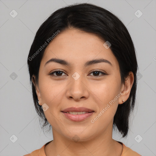 Joyful asian young-adult female with medium  black hair and brown eyes