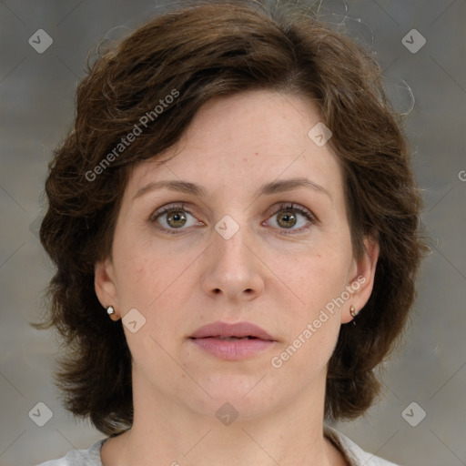 Joyful white young-adult female with medium  brown hair and green eyes