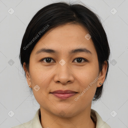 Joyful asian young-adult female with medium  brown hair and brown eyes