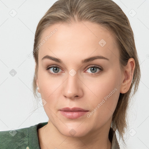 Joyful white young-adult female with medium  brown hair and blue eyes