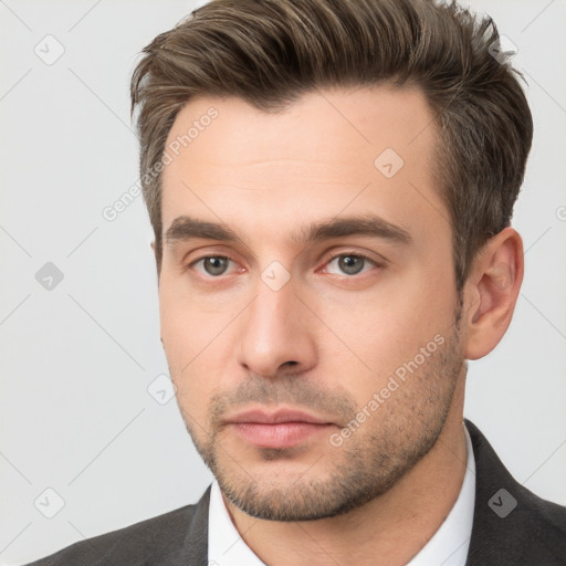 Neutral white young-adult male with short  brown hair and brown eyes