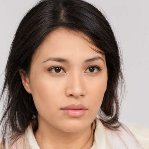 Neutral asian young-adult female with medium  brown hair and brown eyes