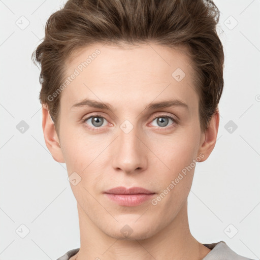 Joyful white young-adult female with short  brown hair and grey eyes