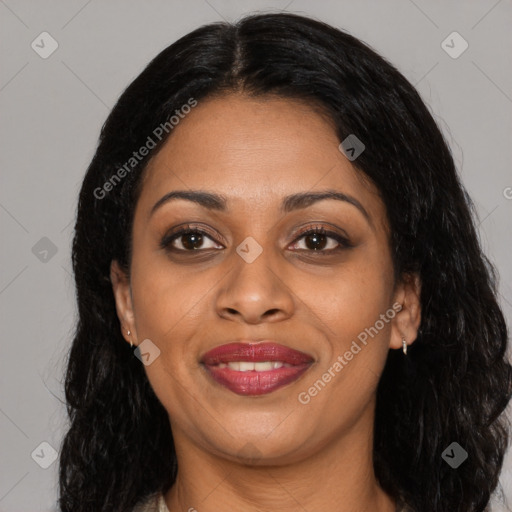 Joyful latino young-adult female with long  black hair and brown eyes