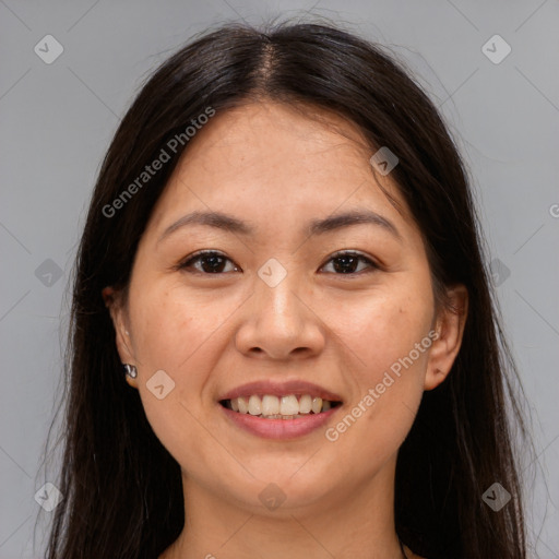 Joyful asian young-adult female with long  brown hair and brown eyes