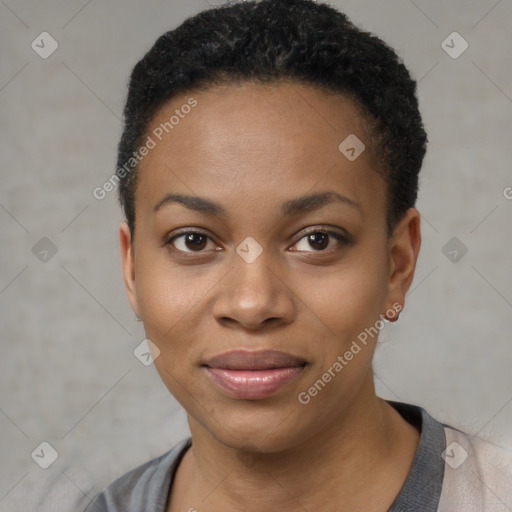 Joyful black young-adult female with short  black hair and brown eyes