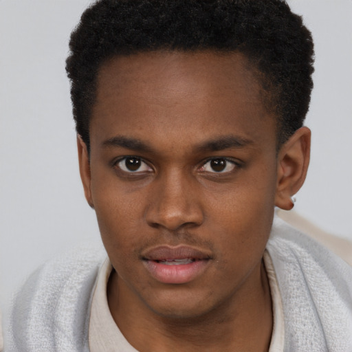 Neutral black young-adult male with short  brown hair and brown eyes