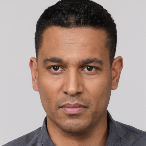 Neutral white adult male with short  black hair and brown eyes