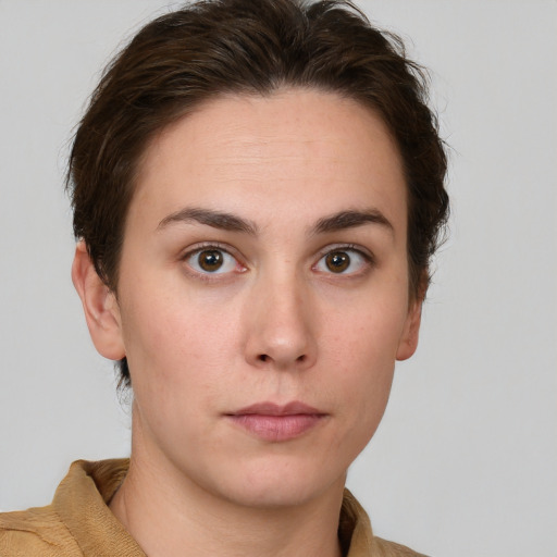 Neutral white young-adult female with short  brown hair and brown eyes