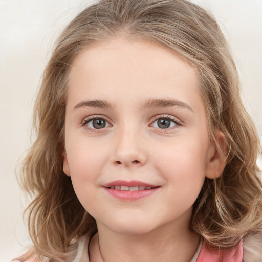 Joyful white child female with medium  brown hair and grey eyes