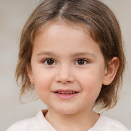 Joyful white child female with medium  brown hair and brown eyes