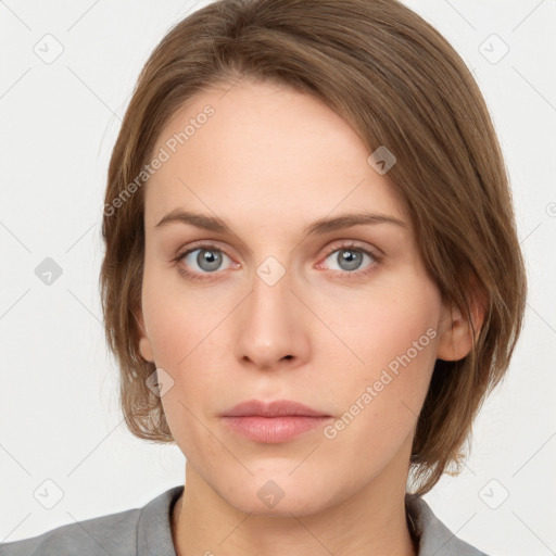 Neutral white young-adult female with medium  brown hair and grey eyes