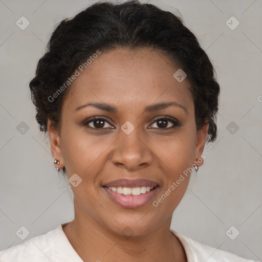 Joyful black young-adult female with short  brown hair and brown eyes