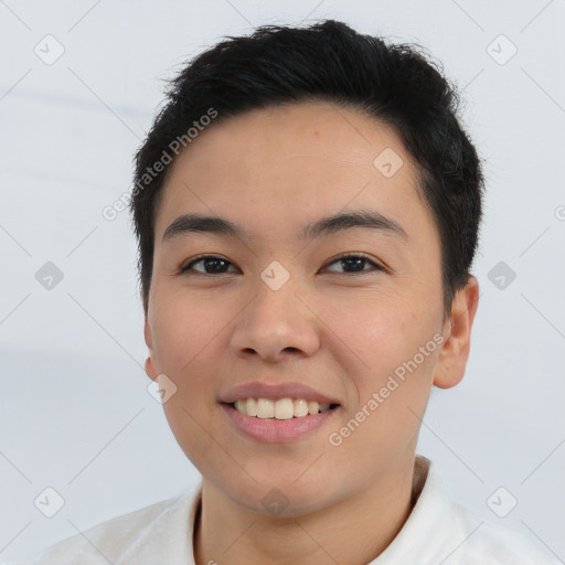 Joyful asian young-adult male with short  brown hair and brown eyes