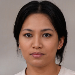 Neutral asian young-adult female with medium  black hair and brown eyes