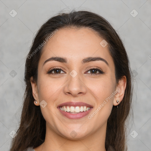 Joyful white young-adult female with long  brown hair and brown eyes