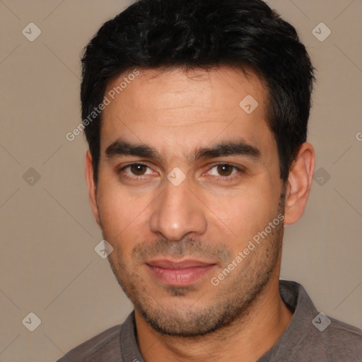 Joyful white young-adult male with short  black hair and brown eyes