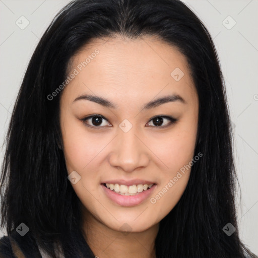 Joyful asian young-adult female with long  brown hair and brown eyes