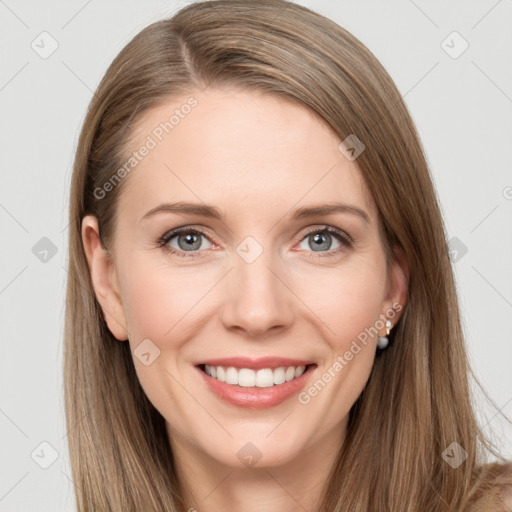 Joyful white young-adult female with long  brown hair and grey eyes