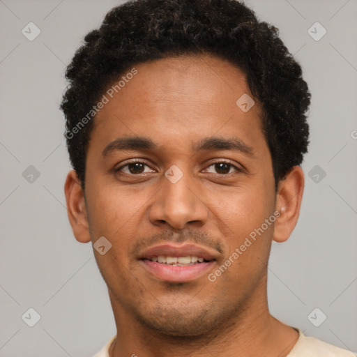 Joyful latino young-adult male with short  brown hair and brown eyes