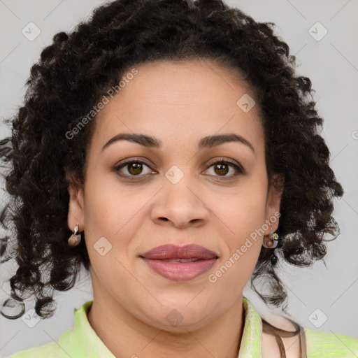 Joyful black young-adult female with medium  brown hair and brown eyes