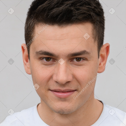 Joyful white young-adult male with short  brown hair and brown eyes