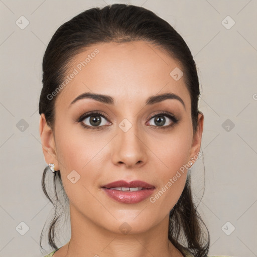 Joyful white young-adult female with medium  brown hair and brown eyes