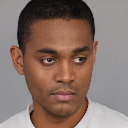 Neutral black young-adult male with short  brown hair and brown eyes