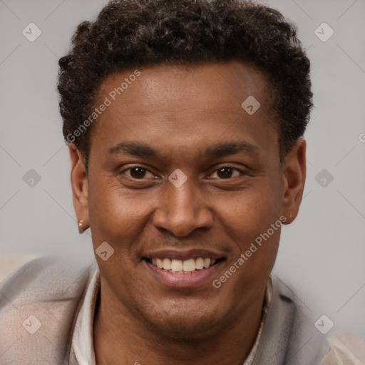 Joyful latino young-adult male with short  brown hair and brown eyes