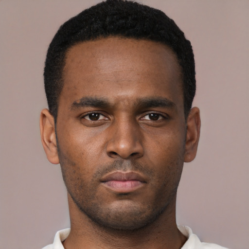 Neutral black young-adult male with short  black hair and brown eyes