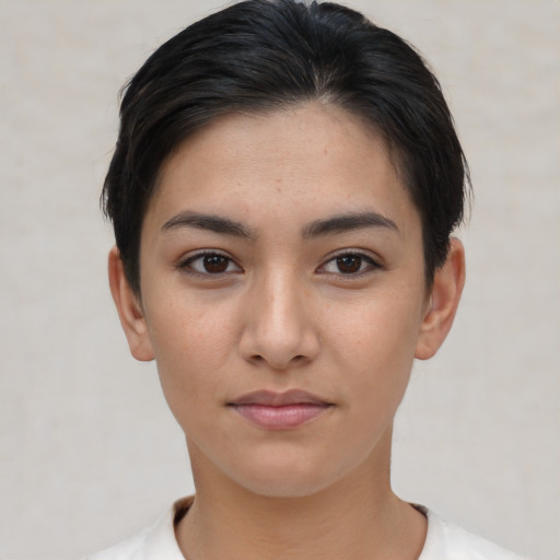 Joyful white young-adult female with short  brown hair and brown eyes