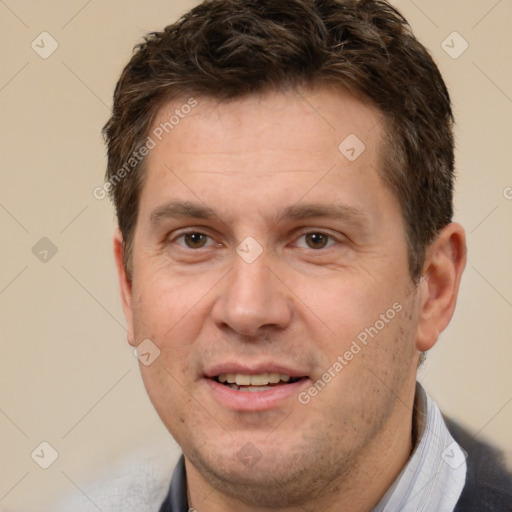 Joyful white adult male with short  brown hair and brown eyes