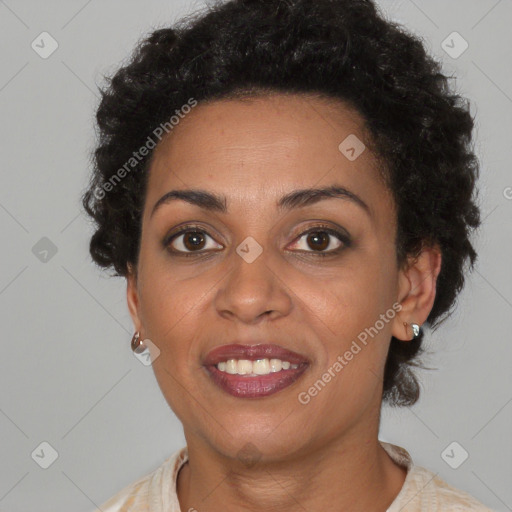 Joyful black young-adult female with short  brown hair and brown eyes