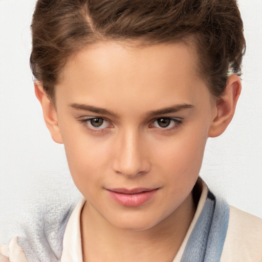 Joyful white child female with short  brown hair and brown eyes