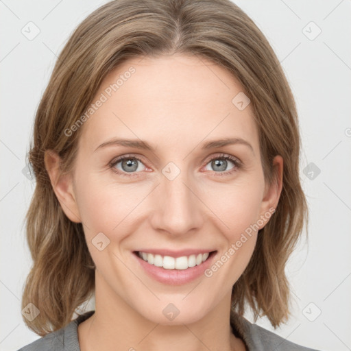 Joyful white young-adult female with medium  brown hair and blue eyes