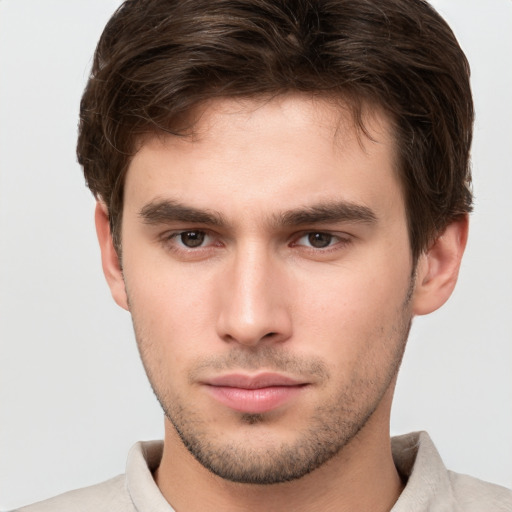 Neutral white young-adult male with short  brown hair and brown eyes