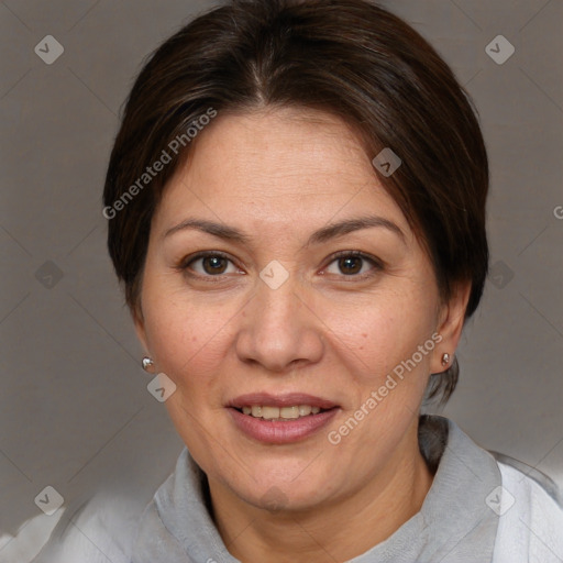 Joyful white adult female with short  brown hair and brown eyes