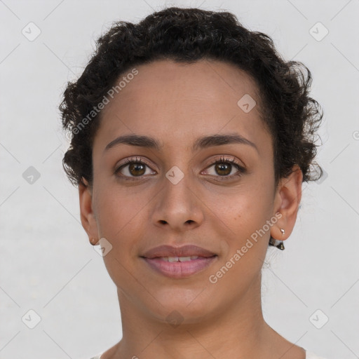 Joyful latino young-adult female with short  brown hair and brown eyes