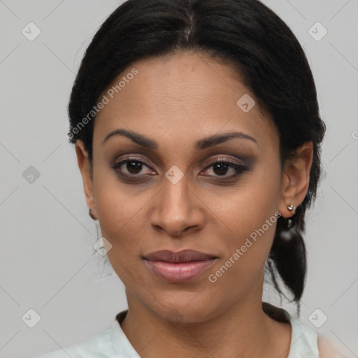 Joyful latino young-adult female with medium  black hair and brown eyes