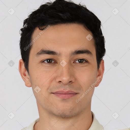 Joyful latino young-adult male with short  brown hair and brown eyes