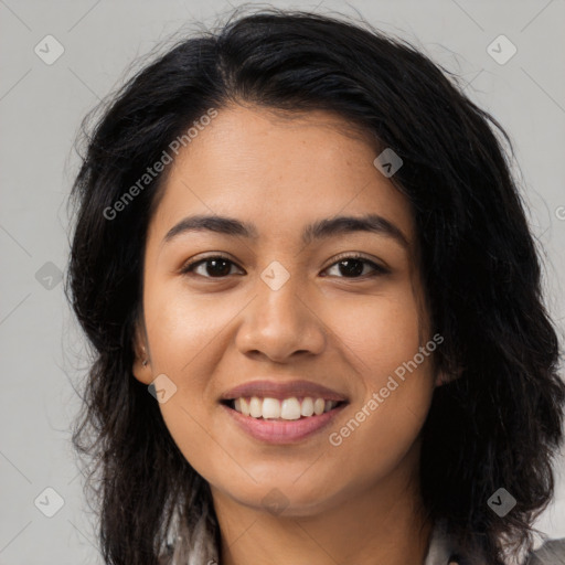 Joyful asian young-adult female with long  black hair and brown eyes