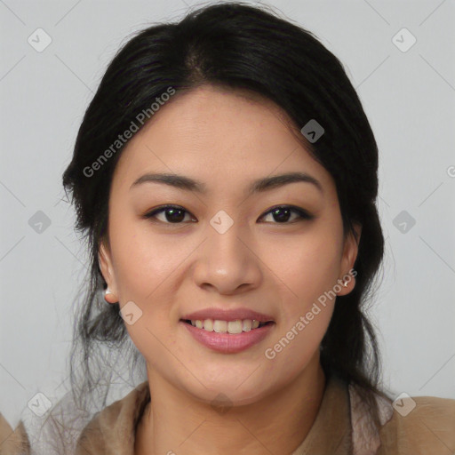 Joyful asian young-adult female with medium  black hair and brown eyes