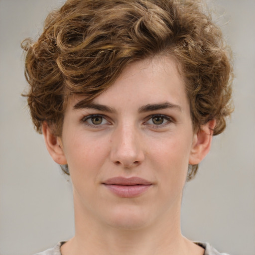 Joyful white young-adult female with medium  brown hair and green eyes